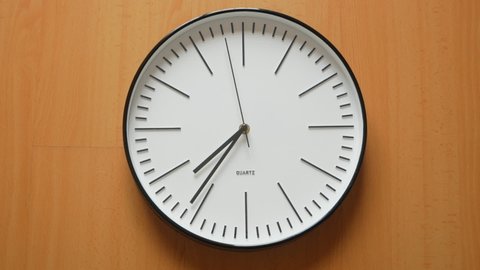 Time Lapse Of One Minute On Quartz Clock Face. - close up static shot