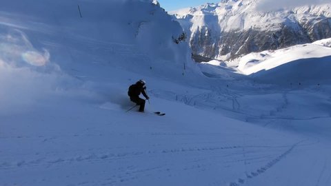 Offpist Skiing In Tirol Austria. Fresh deep snow perfect for skiing offpist. Skiing deepsnow with a ski guide in the backcountry.