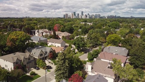 A drone shot over the York Mills neighbourhood reveals the Toronto skyline.