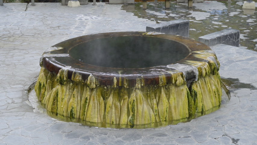Famous natural hot spring well in Raksa Warin public park, Ranong, Thailand.