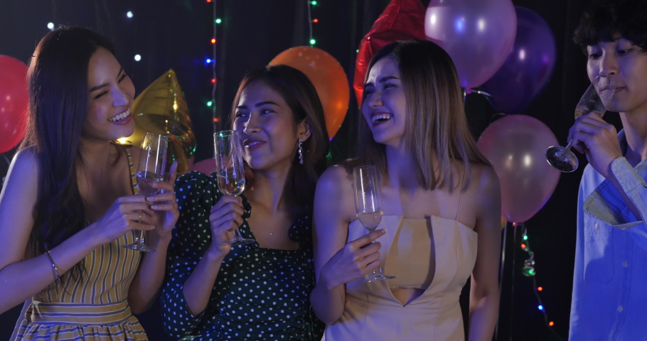 Group of friend having enjoy with night party together. Party new year 2021 event.