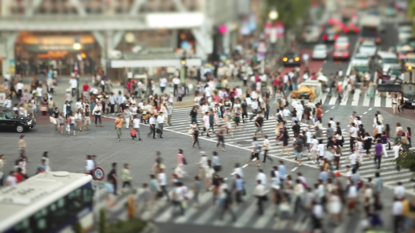 The famous Shibuya Crossing in Tokyo Japan with it's crowds of people, shot with a tilt-shift lens Royalty-Free Stock Footage #1062938710