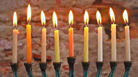Candles with orthodox jewish light a hanukkah menorah