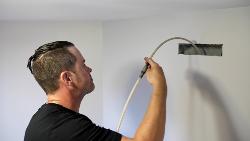 ventilation cleaner man at work with tool