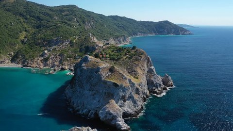 Aerial drone video of scenic landmark old Byzantine castle of Skiathos island built on a cliff overlooking the Aegean sea, Sporades, Greece