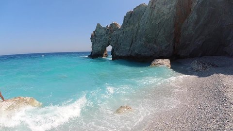 Slow motion video of beautiful exotic beach of Lalaria with turquoise crystal clear sea, Skiathos island, Sporades, Greece