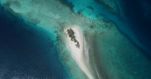 Aerial view of isolated natural island, Northern Maldives. High quality 4k footage