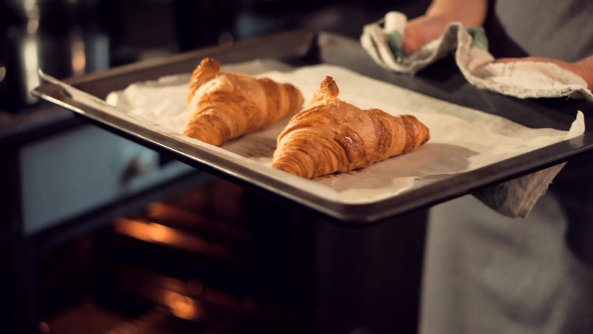 Home Baking Handmade Dessert On Kitchen Oven. Warm Crispy Baked Croissant Cooked In Oven. Morning Homemade Breakfast Food. Fresh Tasty French Croissant On Breakfast. Appetizer Bakery Food Crunch Cake Royalty-Free Stock Footage #1062962728