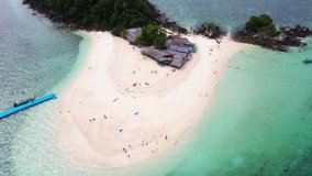 4K Scene of Beautiful nature Aerial view of drone, Top view Turquoise Sea and White beach sand, Seawater clear and blue green. Nature in Khai Iland. At Khai island, Phuket, Thailand. Nature and travel