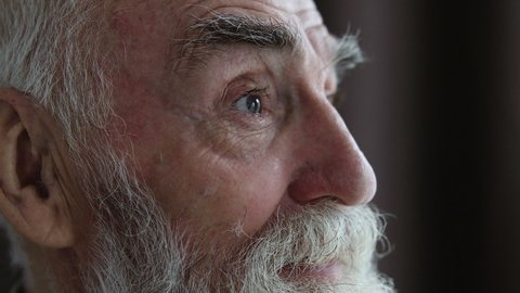 Senior male pensioner crying, feeling grateful for religious help, enlightenment