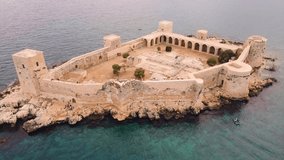 Aerial footage of Kizkalesi fortress. Mediterranean sea. Mersin, Turkey. 