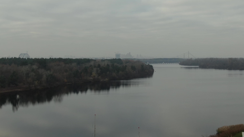 Dnieper river in cloudy weather with perfect tonal perspective