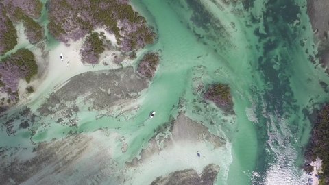 Aerial drone view of islands, sand bar, boating, mangroves near Key West FL
