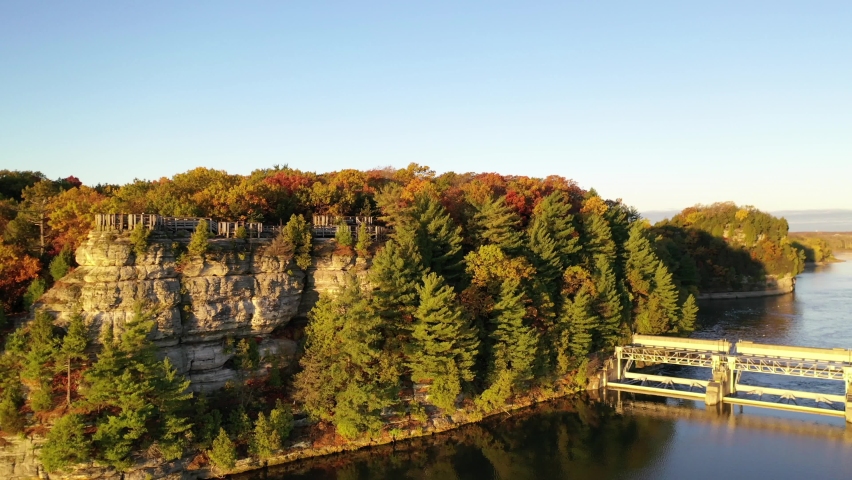 Cliff side river bank aerial view from over the water of the Eagle Cliff Overlook at Starved Rock State Park.