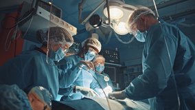 Professional surgeon teaching younger interns performing organ surgery transplant operation with modern equipment. Futuristic mock-up animated hologram panel. Technologies. - Powered by Shutterstock - Get 15% off with code: PIKWIZARD15