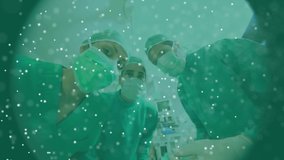 Animation of spinning 3D DNA strand formed with white particles over group of surgeons in face masks. Global medicine research science concept digitally generated image. - Powered by Shutterstock - Get 15% off with code: PIKWIZARD15