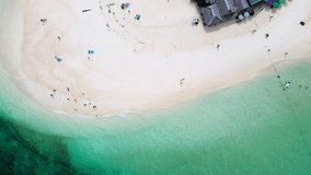 Top view of Beautiful Turquoise Sea and White beach sand in copy space, Aerial view of drone, Seawater clear and blue green. Nature in Khai Island. At Khai island, Phuket, Thailand. Travel concept.