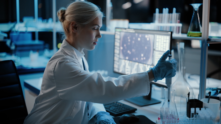 Medical Research Laboratory: Portrait of Female Scientist Working with Samples, using Micro Pipette Analysing Sample. Advanced Scientific Lab for Medicine, Biotechnology, Vaccine Development Royalty-Free Stock Footage #1063038277