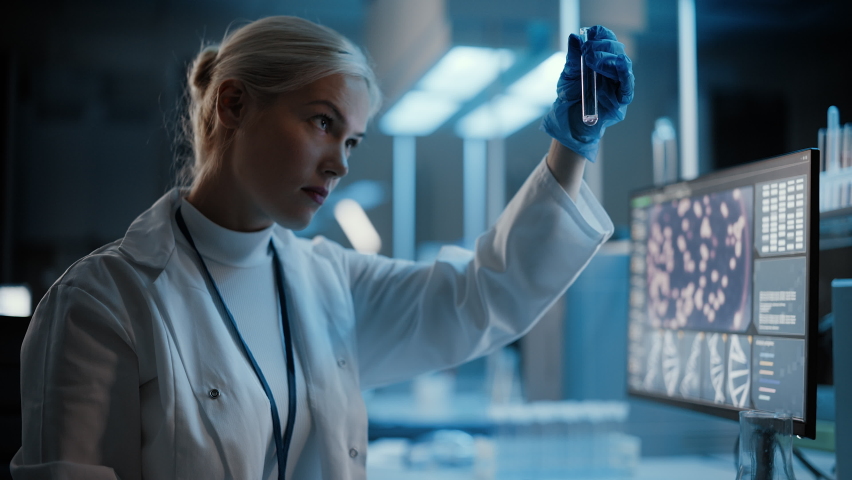 Medical Research Laboratory: Portrait of Female Scientist Working with Samples, using Micro Pipette Analysing Sample. Advanced Scientific Lab for Medicine, Biotechnology, Vaccine Development | Shutterstock HD Video #1063038277