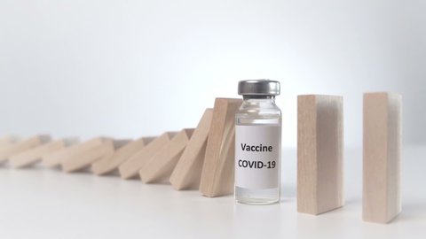 Vaccine of COVID-19 Stopped the Domino Effect. Slow Motion, Selective Focus