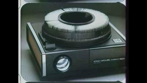 1970s Rochester, NY. Eastman Kodak Carosel Slide Projector 4K Overscan of 16mm Film from Vintage Television Commercial Advertisement