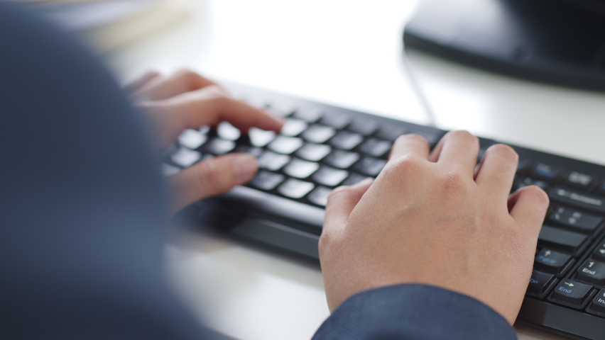 Closeup business people hands typing on keyboard computer desktop for using internet, searching data, working, writing email. Royalty-Free Stock Footage #1063059349
