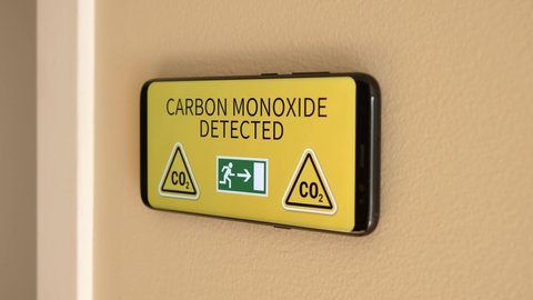 Smart home showing a warning about the high levels of carbon monoxide present in the air.