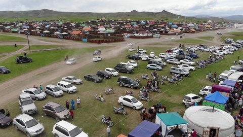 Crowded People Gather for Mongolia's Traditional National Holiday Naadam Festival. Mongolia Mongolian crowd aerial fest wrestling festivity conviviality carnival fiesta gaiety kermess kermis ethnic 4K
