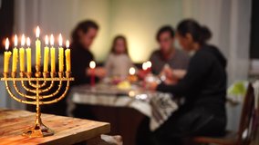 Hanukkah in Israel, a joyous celebration of family, freedom, and light, is a holiday celebrated at home, and lasting for eight days. Lighting the candles, which are held in menorah or hanukkiyah - Powered by Shutterstock - Get 15% off with code: PIKWIZARD15