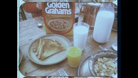 1970s Golden Valley, MN. A Family Eats Golden Grahams Breakfast cereal. 4K Overscan of 16mm Film from General Mills Television Commercial Advertisement