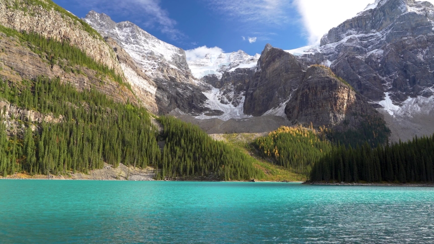 Moraine lake beautiful landscape in summer to early autumn sunny day morning. Sparkle turquoise blue water, snow-covered Valley of the Ten Peaks. Banff National Park, Canadian Rockies, Alberta, Canada