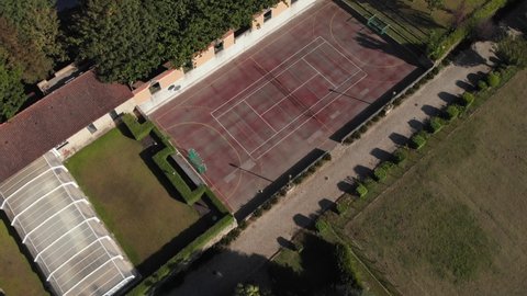 DRONE AERIAL FOOTAGE: Abandoned sports facilities on a large mansion estate near Esposende, Portugal.