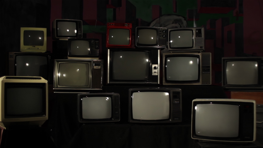 Stack of Retro Television Sets Turning On Green Screens. 4K Resolution. | Shutterstock HD Video #1063097674