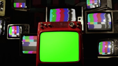 Vintage Television Sets with Color Bars and Retro TV with Green Screen. Zoom In. 4K Resolution.