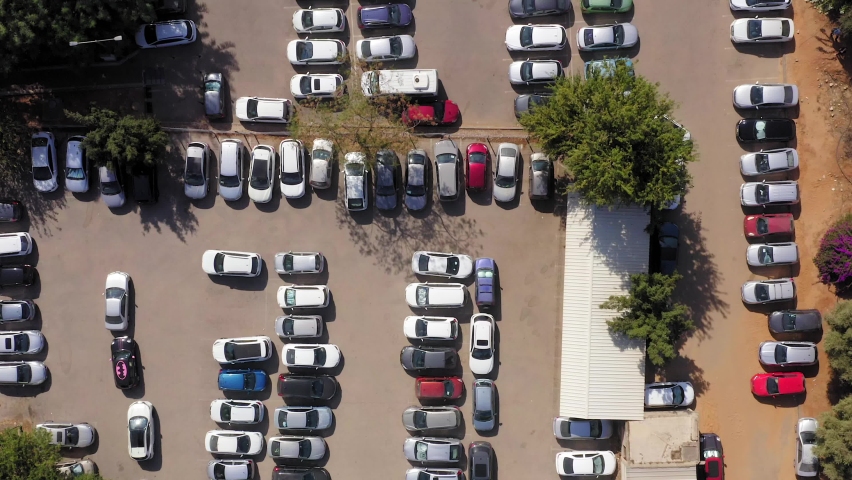 Camping site parking lot full of Cars during holiday season, Aerial view.