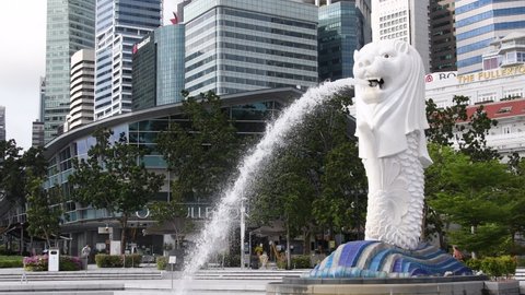 Singapore- 20 Nov, 2020: Merlion fountain in front of the Marina Bay Sands hotel in Singapore. Merlion is a imaginary creature with the head of a lion, seen a symbol of Singapore