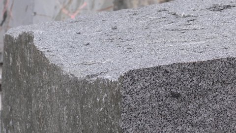 Rough granite blocks for construction industry. Granite blocks extracted through wire rope and blasting techniques
