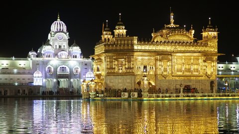 Night view of the Golden Temple aka Harmandir Sahib in Amritsar, Punjab, India. The Golden Temple is the Sikhs' holiest shrine and one of the most important religious sites in India. 