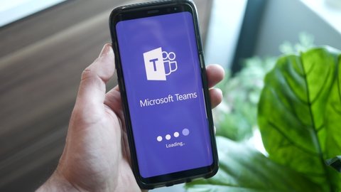 Loading the popular Microsoft Teams app on a mobile phone screen. The application used for video conference during the Covid-19. MONTREAL CANADA NOVEMBER 2020