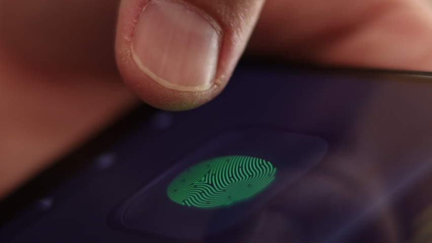 Scanning a fingerprint on an electronic device. Royalty-Free Stock Footage #1063134850