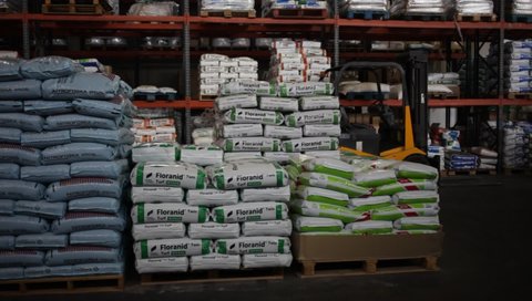 BARCELONA, SPAIN - NOVEMBER 14, 2019: Assortment of organic and mineral fertilizers in bags for sale in agricultural store