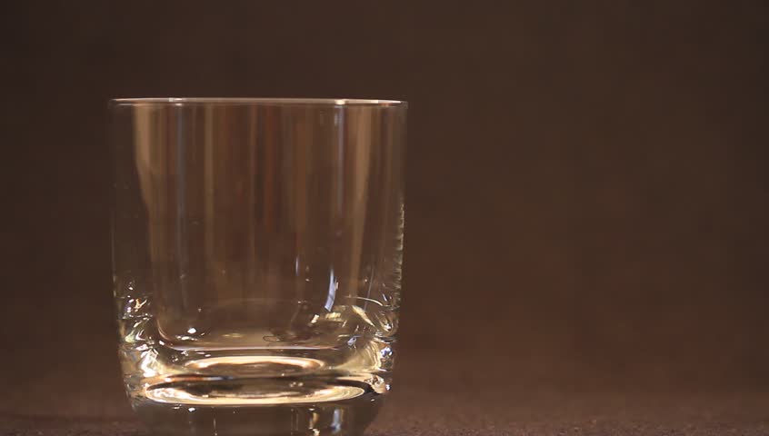 Pouring water in a glass