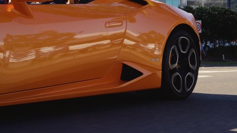 Sydney , Australia - 09 01 2018: Low Angle Side View of a Lamborghini Huracan Driving Down the Road. 