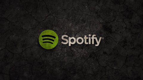 Munich , Germany - 02 22 2020: Logo of music streaming app Spotify crashing down into dust on earth ground. Editorial animation