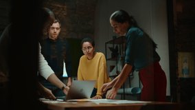 Diverse Multiethnic Team are Having a Conversation in a Meeting Room Behind Glass Walls in a Creative Office. Colleagues Lean On a Conference Table and Discuss Business, App User Interface and Design. - Powered by Shutterstock - Get 15% off with code: PIKWIZARD15