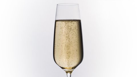 Sparkling white wine champagne or cava in champagne glass with bubbles