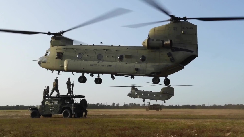 CIRCA 2020 Soldiers, airmen and Chinook and Black Hawk helicopter operations during training exercise Guardian Shield Royalty-Free Stock Footage #1063184020