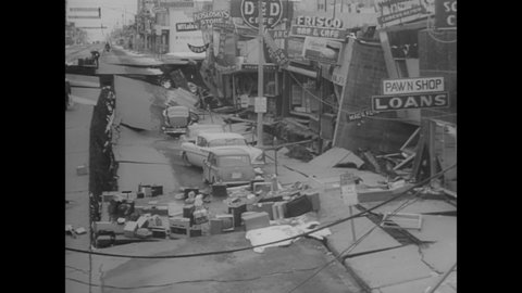 CIRCA 1964 - An earthquake brings considerable property damage to Alaska.