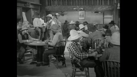 CIRCA 1939 - In this western film, African-American cowboys sing "Almost Time for Roundup" in a saloon.