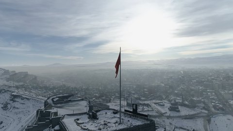 Aerial view of Turkish Flag and Kars City Landscape in Turkey